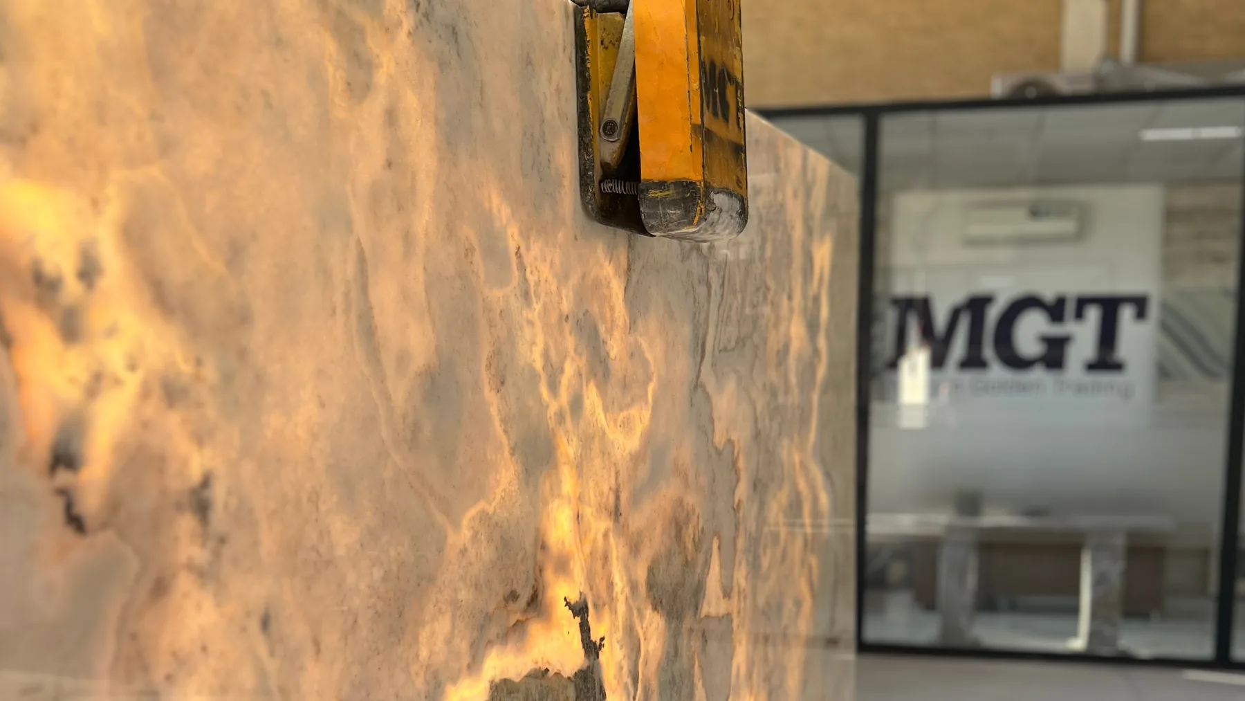 Close-up of a backlit translucent onyx stone slab