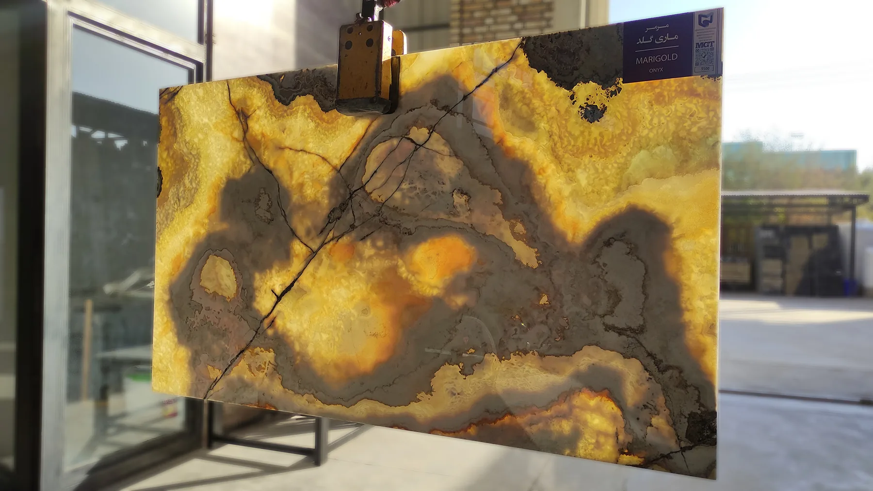 Polished onyx slab displayed at a stone exhibition